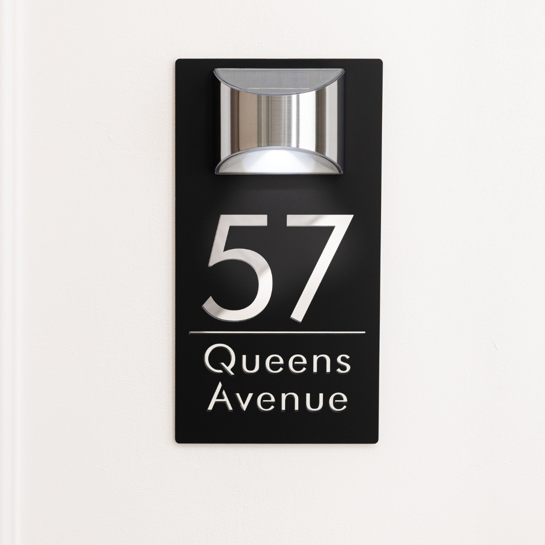 Modern house number sign with &