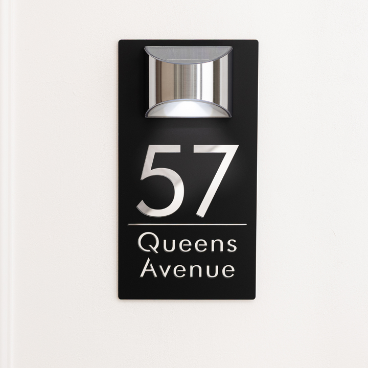 Modern house number sign with &