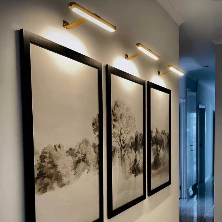 Close-up of cordless LED picture wall light with sleek modern finish