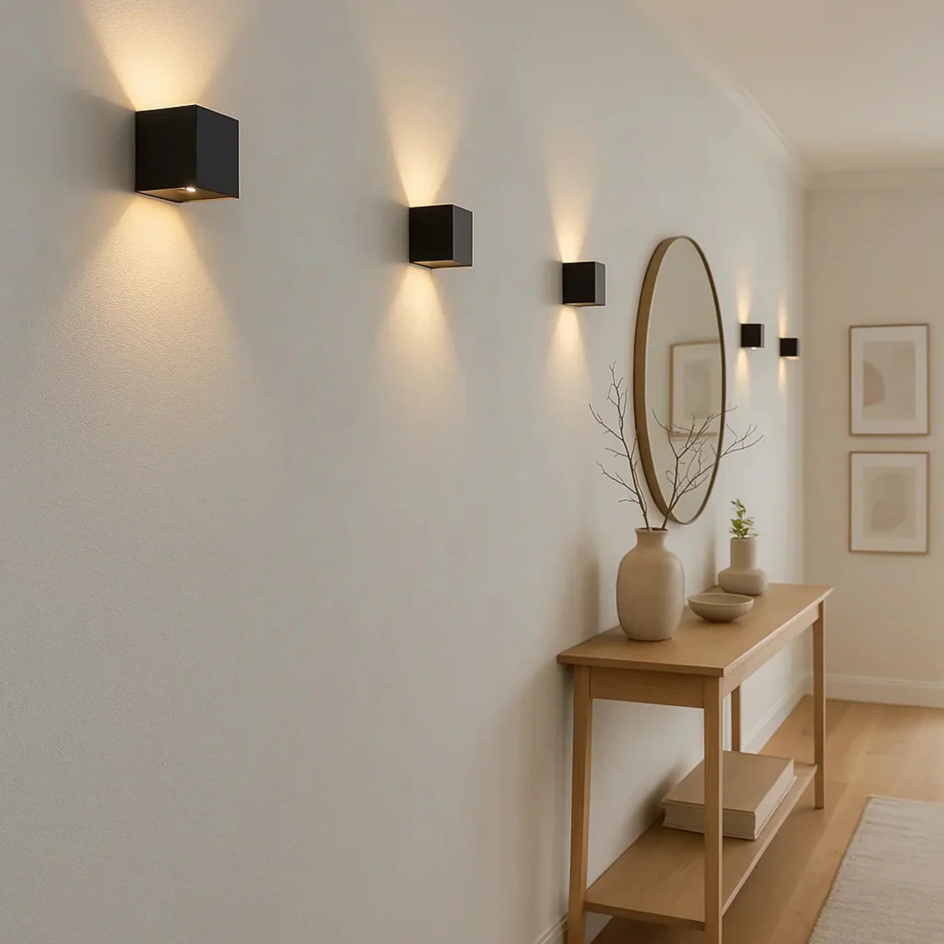 Small cordless ambient wall lamp mounted in a hallway